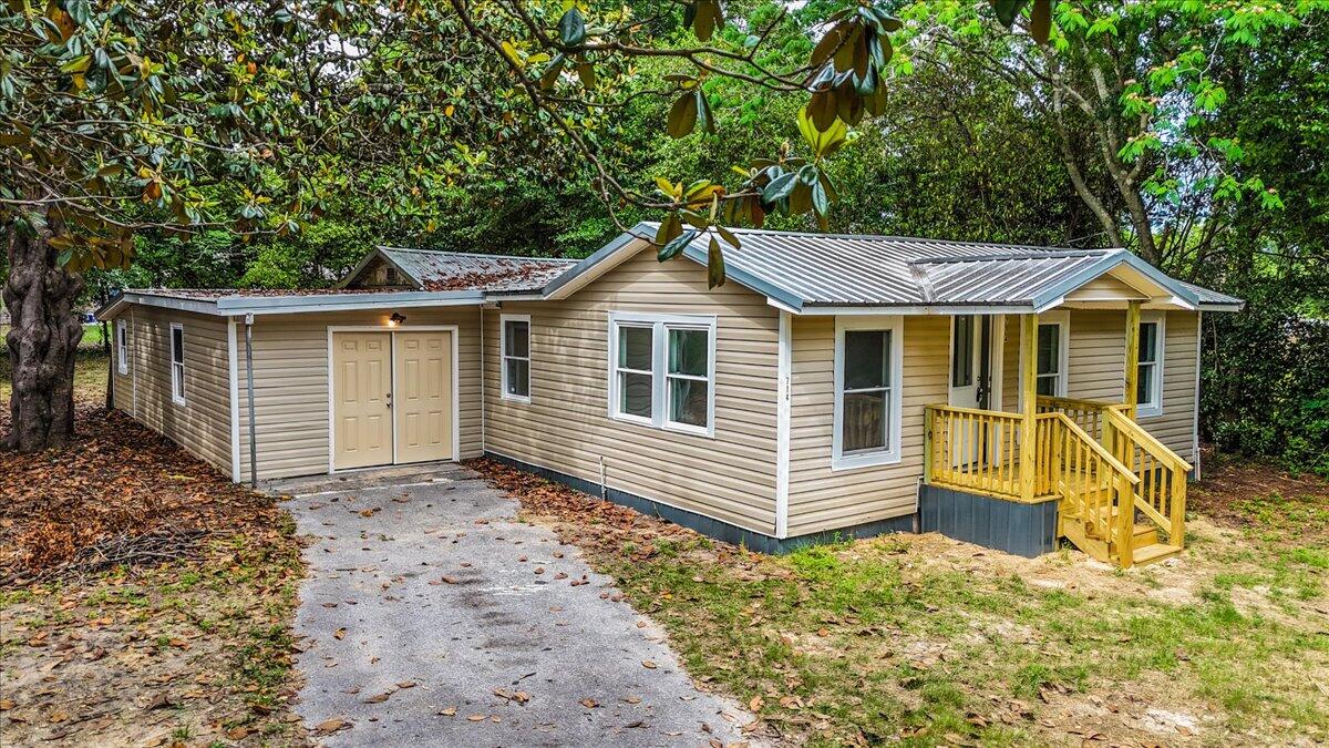 Adorable newly remodeled home in the heart of town! This cozy spot features fresh updates throughout, including a modern kitchen, updated bath, new flooring, and multiple storage rooms for all your extras. Enjoy a low-maintenance yard and a location just minutes from shops, parks, and restaurants. Move-in ready and full of charm!