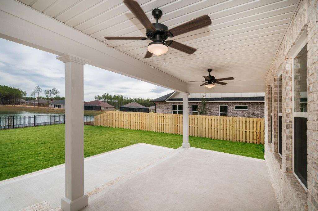 Laurel Oak plan has 2,443 square feet, three bedroom, study and 3 baths. Brick exterior, covered rear porch with ceiling fan and a 2 car garage. Interior finishings include, 9' ceilings, granite counter tops, laminate, tile and carpeted floor coverings, crown molding, cased windows and openings. Upgrades include floor plug in living room, laminte in study and master bedroom, Oil Rubbed Bronze fixtures, refrigerator/freezer combo, blinds, steel tub with tile surround in bath 2 and sink in laundry room with upper and lower cabinets. Natural gas range and Rannai tank water heater. Stainless Frigidaire appliances, WoodHarbor cabinets with 100 year finish warranty, tiled shower and tub deck in master and bath 2.