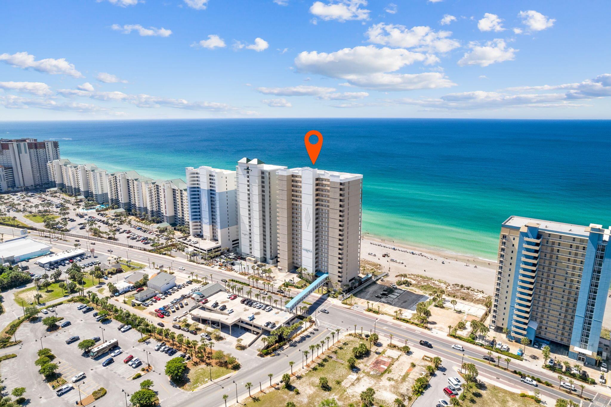 Welcome to your perfect beach getaway! This stunning 2-bedroom, 2-bathroom PENTHOUSE, END UNIT is situated in one of the newer buildings in Panama City Beach and offers luxurious living with unobstructed Gulf views. Upon entering this elegantly furnished and decorated condo, you will be greeted by the warm and inviting atmosphere. With hardwood floors, custom cabinets, granite countertops, top-of-the-line Samsung appliances, and high ceilings, this home offers everything you could want in a beachfront retreat.The advantage of being the end unit is that not only you get the perfect sunsets from your oversized, almost 300 sq.ft. balcony, but you also get to see the night lights of Front Beach Rd.! With it being such a large space, the balcony is perfect for entertaining friends and family