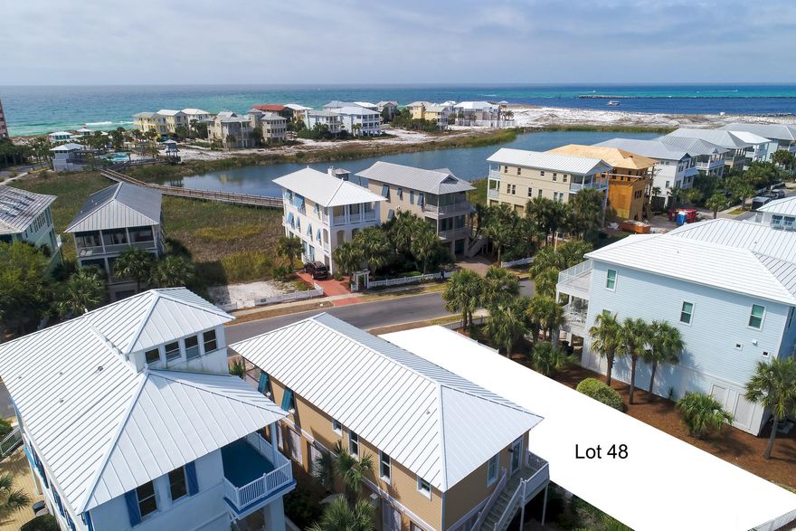 Ideal building lot on Rosalie in Destin Pointe that affords views of the Gulf, Lake and Destin's East Pass. It is right across the street from Lake Rosalie and near the lake walkover to the beach. It's centrally positioned in the heart of Destin Pointe near all of the community's many amenities, including, tennis courts, two pools, a fitness room, deeded beach frontage, shuffle board courts and 24 hour security. Also available for purchase is an approved set of plans for a 3-bdr, 4.5 bath, plus bunkroom home with 2 master suites. Property is under contract to a 72-hour kick out clause.