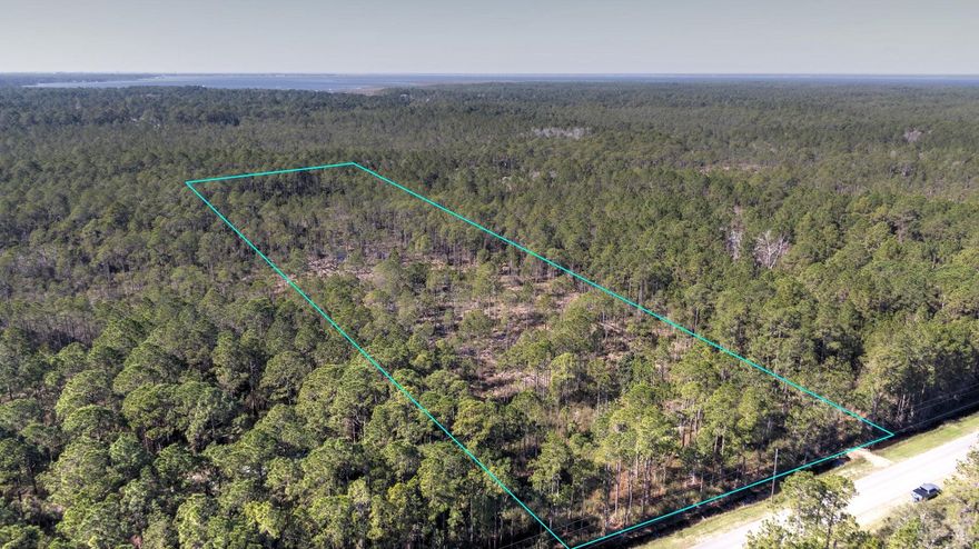 This 10 acre lot is located in the heart of Santa Rosa Beach, located between the Choctawhatchee Bay and the Beaches of South Walton. Close to restaurants, hospitals, schools, and shopping, this growing area is great place for residential home or homes.  Call Listing Agent for details. All information is based on available data and deemed accurate but as always, buyer to verify all information.