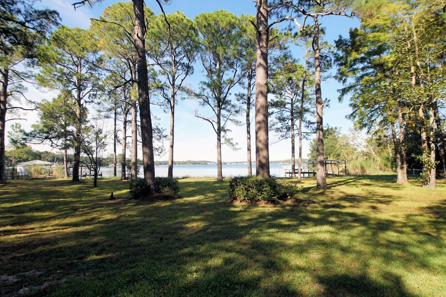 Waterfront living at its best on Boggy Bayou in Valparaiso, FL.   OMG!!! 1.17 acres and 75 feet of bayou water frontage!  Deep water bayou so you can bring your sailboat.    This is a one-owner home that though it needs updates was loved!  NEW ROOF October 2021.  You don't want to miss out on this opportunity to own your own waterfront estate.   Florida Park  located a short walk  is a lovely park  with a boat ramp and fishing dock, picnic tables, playground, etc...Home is in Flood Zone X no flood insurance required.