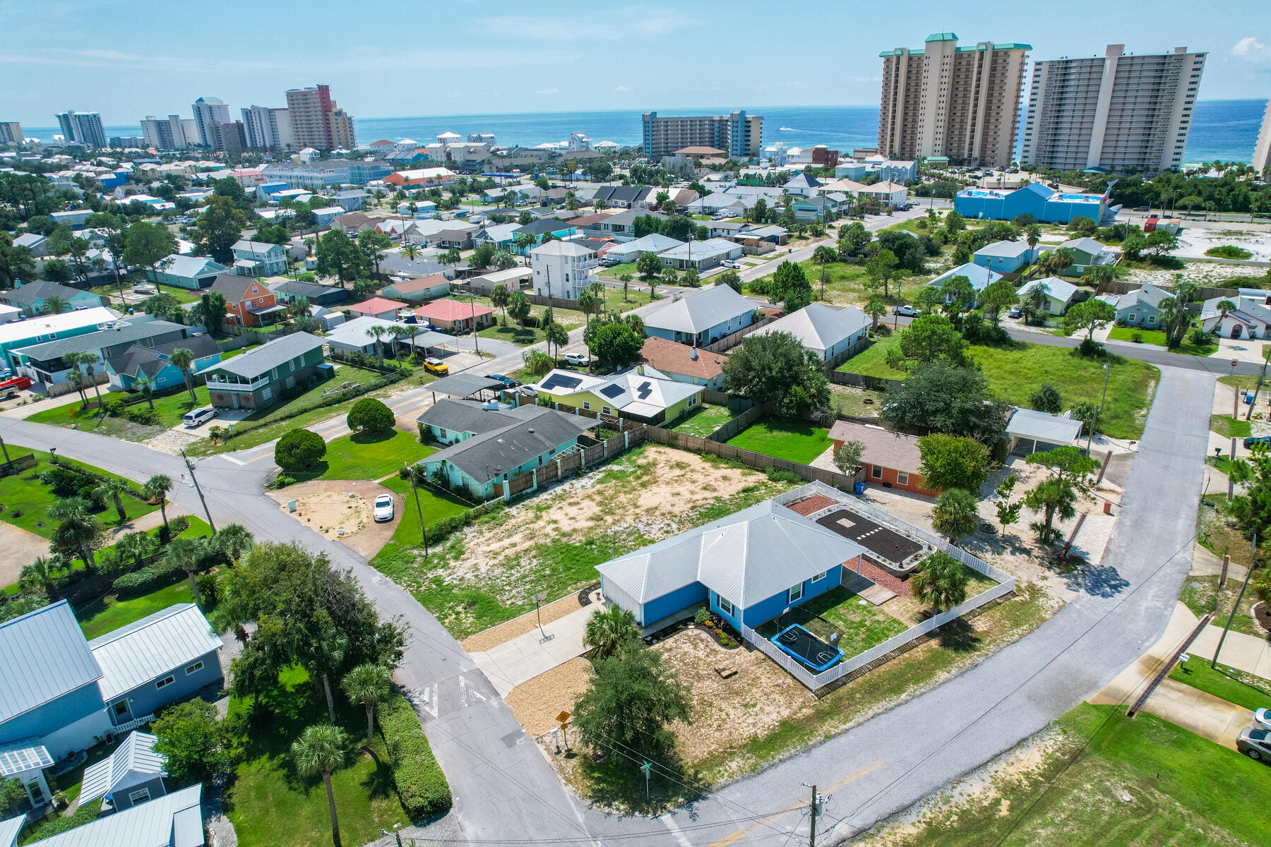 Calling all INVESTORS and BEACH LOVERS!! This 3/2 is nestled between the Gulf of Mexico's most beautiful beaches and the Grand Lagoon. Short term rental central describes the location the best! Hop on a golf cart and head to the beach or keep your boat nearby because there are 3 public boat launches for your use on South Lagoon Drive alone. This home has a metal roof, tile floors throughout, fresh sod, automatic water for the flower beds, bunk beds, mounted TV's, and plenty of parking! This is your chance to grab a STR or beach house for you and your family at a very aggressive price! Call today before it's gone! Bring ALL offers.