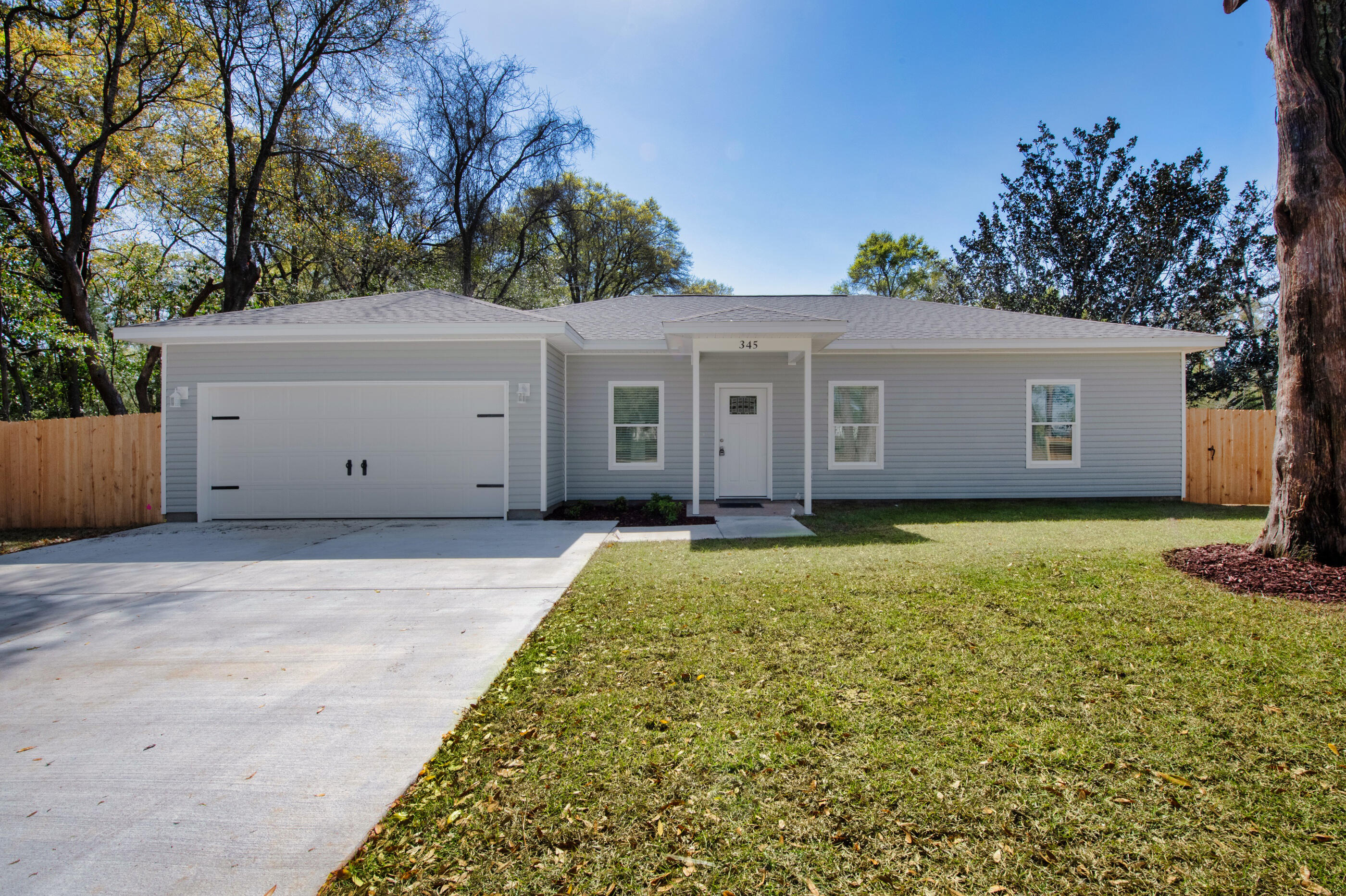 NEW CONSTRUCTION. STAR QUALITY, CUSTOM BUILT, 3BR. 2 BA HOME, AN ARRAY OF SPECIAL FEATURES! 75' FLAT SCREEN TV, 60' ELECTRIC FIREPLACE, LIVING/GREAT ROOM, NINE FOOT CEILINGS AND TEN FOOT CEILINGS W/TRAY IN LIVING/GREAT ROOM AND MAIN BR. CEILING FANS IN ADDITIONAL ROOMS! PROGRAMMABLE THERMOSTAT. LENNOX A/C SYSTEM. WASHER AND DRYER UNITS. FULLY LOADED KITCHEN EQUIPPED WITH APPLIANCE PACKAGE. SOFT TOUCH CLOSE WHITE CABINETS, CARRARA COUNTERTOPS, CALI LVP FLOORING THRU-OUT, WALL PAINT COLOR - AESTHETIC WHITE. ELECTRIC SMOKE DETECTORS. SPRINKLER SYSTEM. FENCED YARD. PEEL & SEAL ROOFING. SELLER MAY ASSIST WITH CLOSING COST.