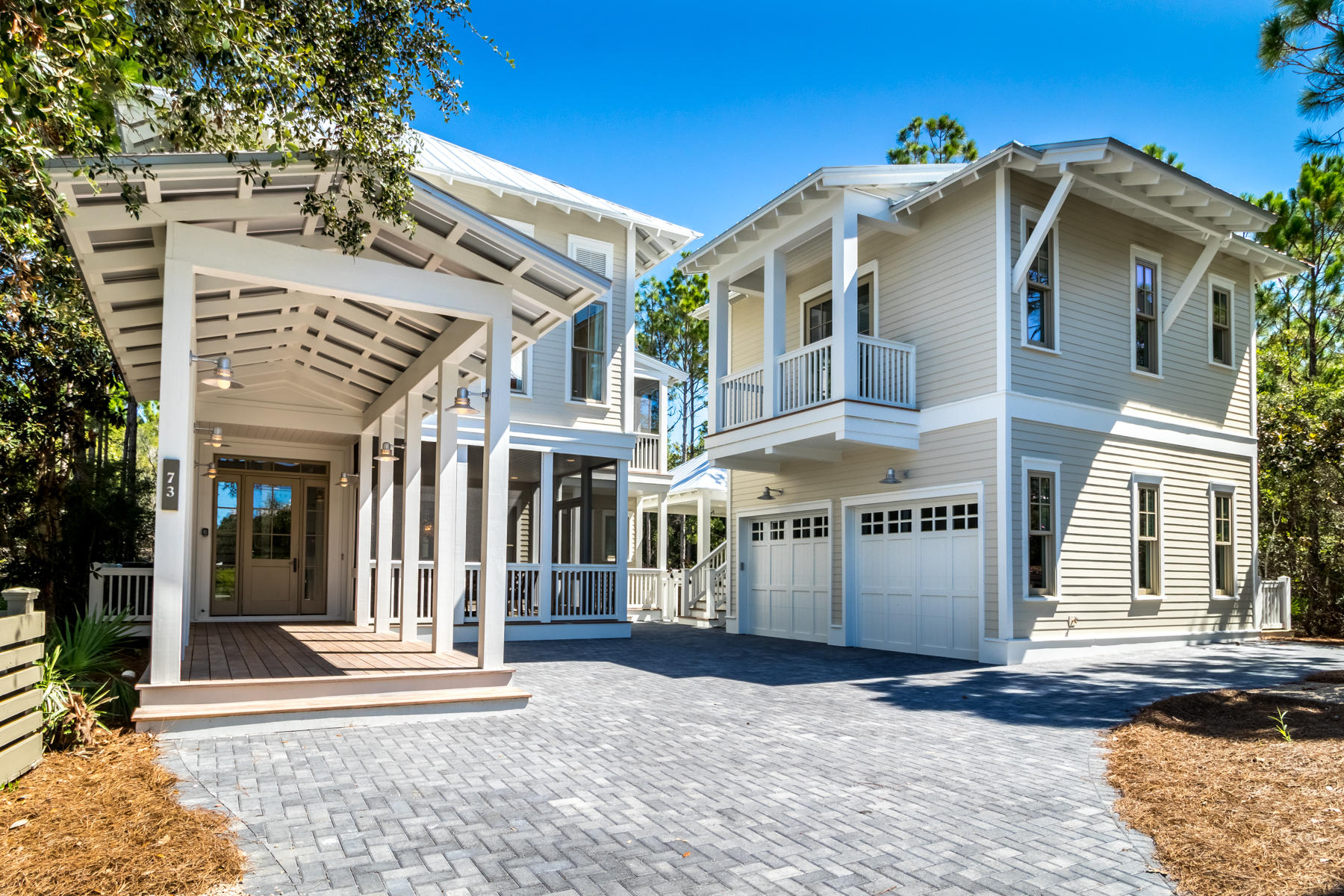 This newly rebuilt custom home by Romair Construction personifies the finest Watercolor lifestyle. 73 Pond Cypress is positioned on one of the most sought-after sites offering privacy and 180 degrees of serene wooded preserve. Vgroove shiplap walls, wire brush oak floors, white quartz countertops, glass beaded chandeliers combine with Bella Beach Interior designs to create coastal elegance perfection. This exquisite home has it all; alluring open layout, outdoor luxury retreat built for entertainment, multiple spacious porches, newly constructed carriage house, 2 car garage and additional parking for 4 vehicles. A crisp new home scent greets you as you enter this meticulous home with a seamless integration of the gourmet kitchen and expansive living area. An exceptional floor plan...