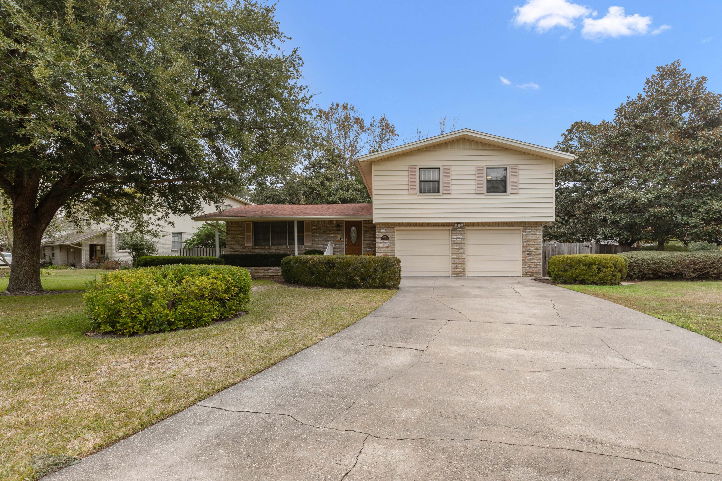 If you have been wanting to own in KENWOOD, look no further! This well-maintained gem in KENWOOD sits on a beautifully landscaped large corner lot. The home was built in 1966 and offers 3-bedrooms, 2 1/2-bathrooms, 2-living spaces, separate dining room, Bonus/Florida room and a 2 Car Garage.  You won't be lacking for living space or storage space.  The roof is 2014, newer Gas Tankless Hot water, newer HVAC-Gas, Natural Gas hook up for outdoor Grill, newer Lawn pump and new Electrical panel. Move in and make it your own. Walkable neighborhood, all schools within a mile of your home, golf, pickleball, easy commutes to Eglin and Hurlburt bases and conveniently located to medical facilities. Provide Proof of Funds or Preapproval Letter with offer.