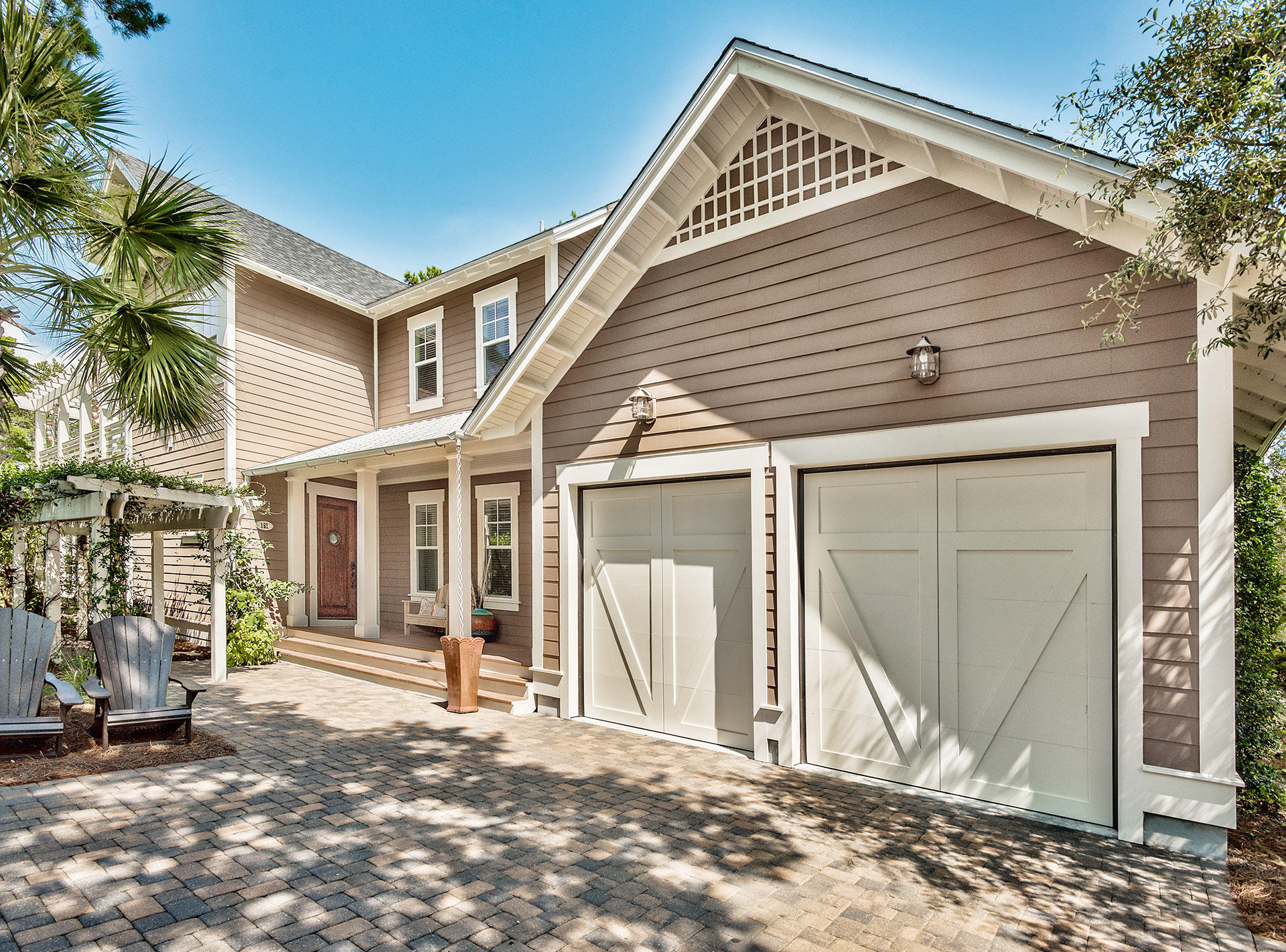 Welcome to your perfect 30a beach home! Located in the private gated community of Watersound West Beach, you will enjoy beach access to one of 30a's premier secluded beaches through Deer Lake State Park. This beautiful home features 3 porches and a large 2nd floor deck overlooking the lake surrounded by bridges and boardwalks. The layout of this home is perfect for visits from family and friends as it boasts a spacious and open kitchen/dining/great room on the main floor as well as a family room located on the second level with built in bunk beds. The location of the bedrooms ensure everyone has their privacy--There is a guest suite on the main level and another guest suite on the second level on one end of the home. On the lakeside is the master suite with expansive views over the water. Off the master is a HUGE L-shaped deck overlooking the lake--a wonderful retreat! The master bath has just been remodeled with gorgeous luxury marble tiles. Beautiful! The fourth bedroom is just off the second level family room and is currently being used as an office. Gorgeous walnut floors flow throughout the entire home and the main living areas are accented with wood shiplap walls. In addition to all the porches and deck space there is also a lovely arbored area off the screened porch that features an outdoor fireplace. This home has had many recent updates including new marble kitchen backsplash, new refrigerator, new A/C, new cumaru wood decking, new temperature controlled ceiling fans, new master bath tile, and more! Home also features Control 4 home automation, cctv monitoring, Sentricon, and 10 year service contract on the HVAC system. Parking is not an issue here as there is a 2-car garage, driveway space for two cars, and an off street parking pad across the street from the home. Watersound West Beach features a community pool/clubhouse, boardwalks, two parks, boardwalk to the beach, and fitness center at Watersound Beach. The beach access is a private perpetual easement through Deer Lake State Park. No crowds and no Customary Use worries! Enjoy the beach life!!!