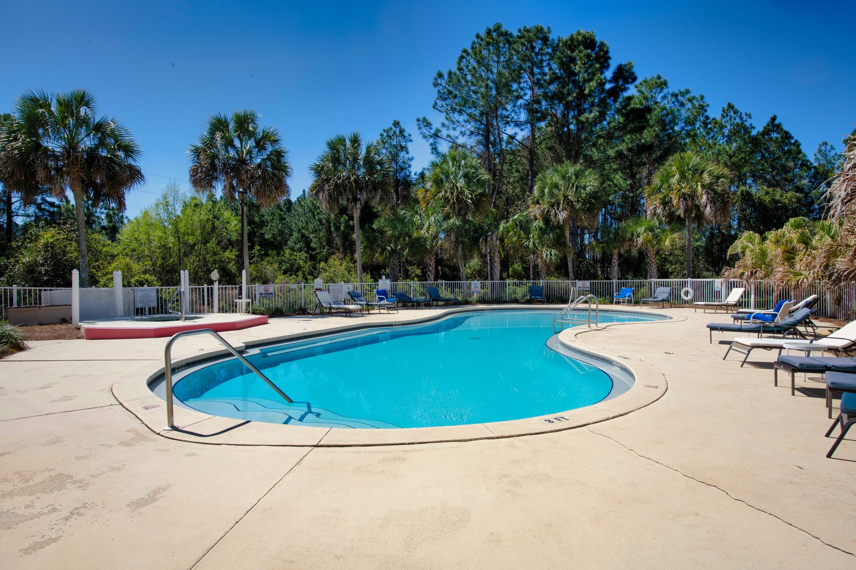 Check out this beautiful condo in the heart of Bluewater Bay, in the Florida Club complex. This unit is on the second floor and is directly next to the elevator for very convenient access. This unit features a screened in back patio which faces the community pool that is perfect for relaxing on those incredible Florida evenings. Schedule your showing today!