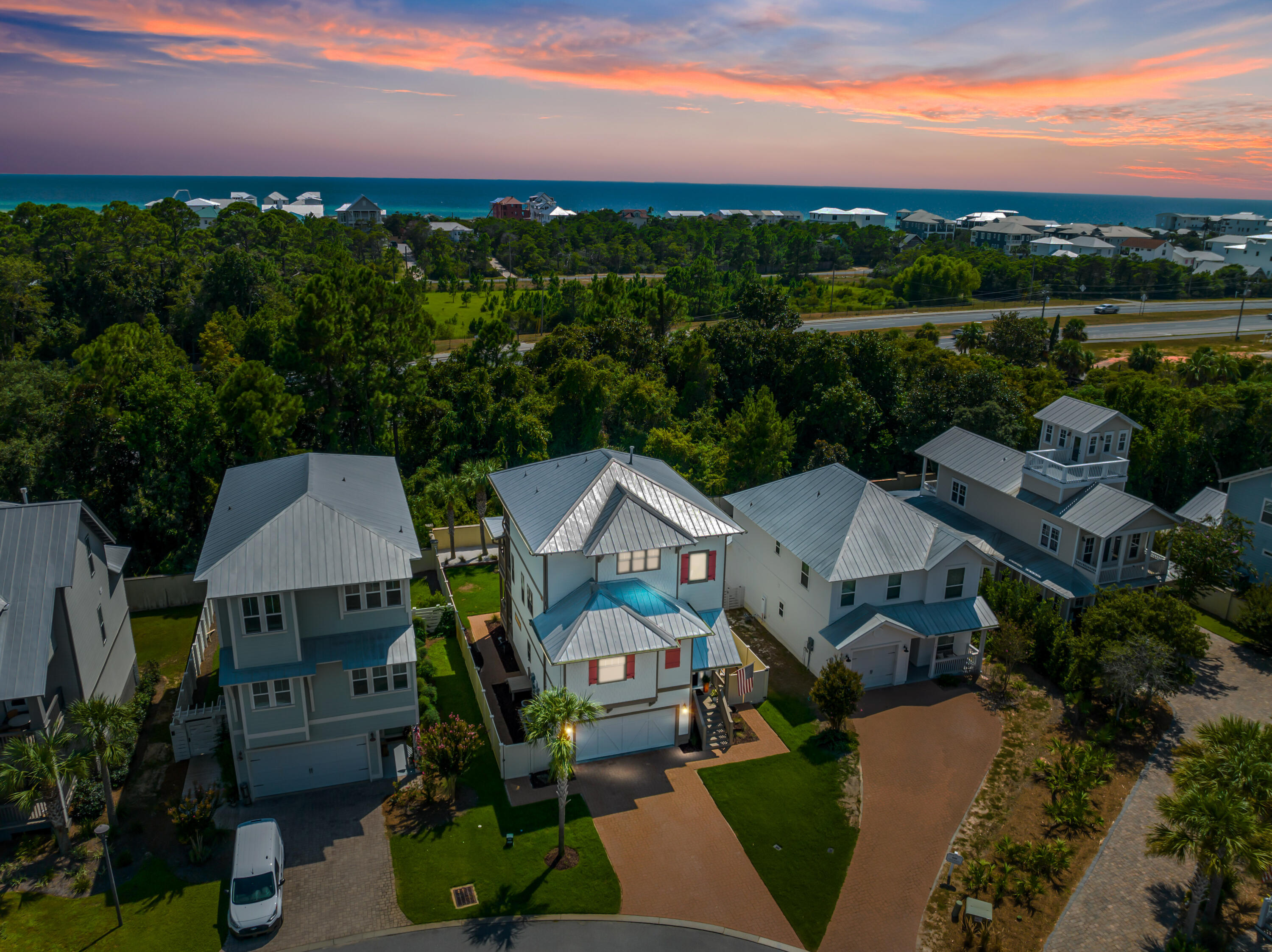 Tucked away just north of Scenic Highway 30A, this three-bedroom, three full bath home has a delightful 3-story floor plan with covered porches. As you enter this lovely home you will find 10-ft. ceilings and tile on first floor, hardwoods on 2nd and 3rd floor. The kitchen has been designed with the gourmet chef in mind with quartz countertops and stainless steel Kitchen Aid appliances including gas cooktop, dishwasher and wall oven. Plenty of upgrades. This unique and functional floor plan design boasts an amazing 3rd floor master bedroom suite that encompasses the entire 3rd floor. With space for an office or cozy sitting area. On the first floor you will find a cozy bar, game room, and a bedroom which could second as an office. Enjoy life at Grande Pointe in Inlet Beach with private access to Lake Powell, a rare coastal dune lake, just moments from the sugar-white sand beaches of South Walton. Grande Pointe boasts an impressive community pool, clubhouse and private dock located on Lake Powell for owners and guests. The neighborhood is located near several public beach accesses; Camp Helen State Park with miles of hiking and biking trails; and Highway 98 to quickly navigate to the airports in Destin or Panama City Beach. It is also conveniently situated near the shops and restaurants at 30Avenue, the new pedestrian tunnel and the world-class amenities along Scenic Highway 30A, making this a perfect investment property or primary residence.