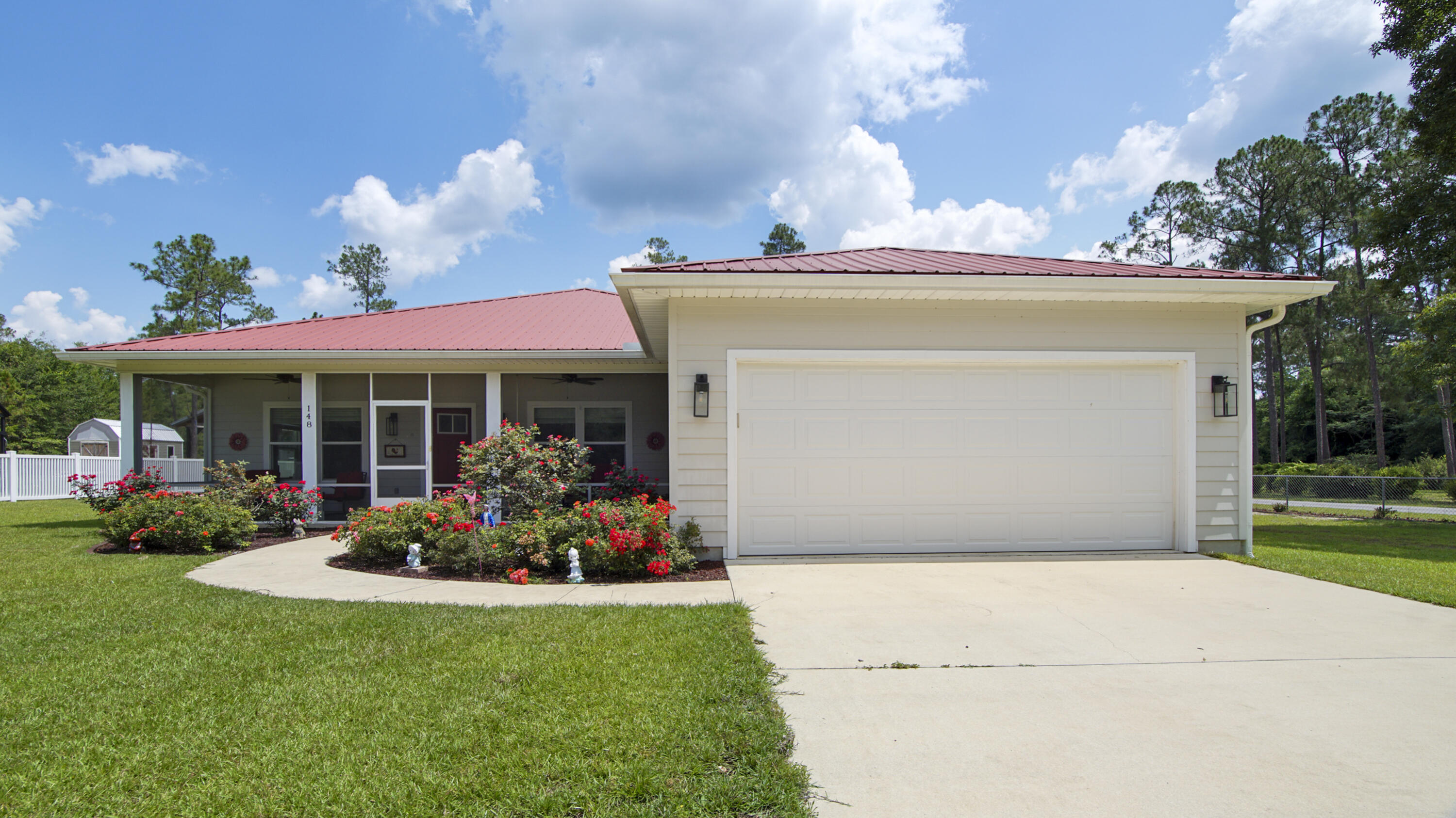 Location, Location!! This beautiful, custom built home in the city limits sits on over 3/4 acre (.8), w/ apx. 1/4 acre past fenceline left wooded...plenty of room for a workshop or a pool! Corner lot makes for easy access from Engelbrecht or Huggins Rd. Construction features on this 2020 home include Hardie Plank siding, metal roof, impact windows, front & garage doors are hurricane rated to 140 mph winds. Walking up to the home, you'll be welcomed immediately by the beautifully landscaped & irrigated front yard. You'll enter the home through the screened porch. Interior features open floor plan, LVP flooring, large utility room with linen closet & addtl. storage/pantry area.City water & sewer, with lawn pump for irrigation. This is an absolute must see...schedule your appointment today