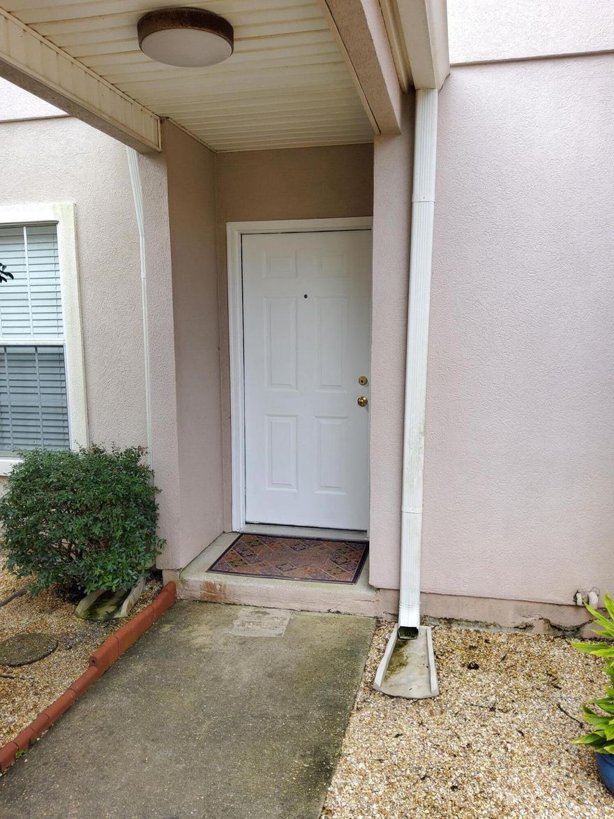 Newly painted with new carpeting. Close to beaches shopping base etc. Includes use of community pool as well as tennis courts