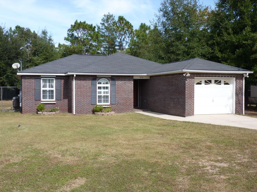 Gorgeous South Crestview home on .48 acres with a large back yard perfect for gatherings and entertaining. Inside you will be welcomed by cathedral ceilings, lots of natural light, an open floor plan with neutral tones and crown molding to finish off the elegant design. High end granite and stainless steel appliances will motivate any chef to create delicious meals. Both bathrooms boast granite and upgraded cabinets with nice fixtures and finishes. The home flows nice with tile in the kitchen, dining rm,living rm,foyer,hall and baths. The master bedroom has luxury vinyl flooring. Plantation Shutters are an upscale addition. The home comes with a 1 year Old Republic Home Warranty. A termite bond is in place. Fresh paint and New HVAC 2016. Storm Shutters and more info..