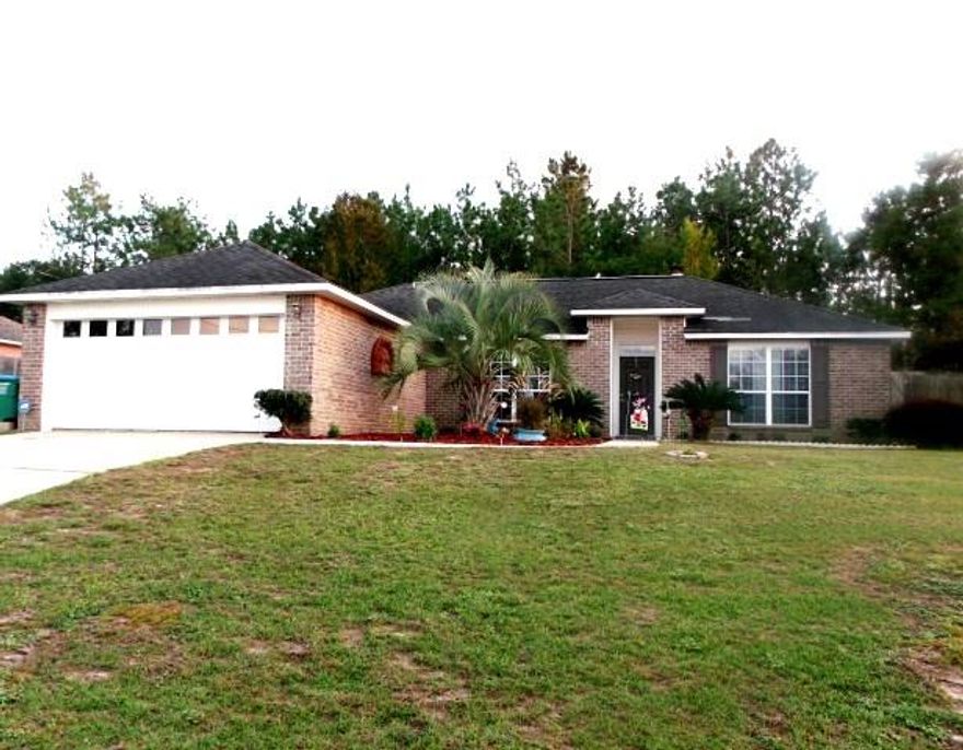 South of I-10 affordable well kept home in Antioch Estates. Curb appeal with palms and easy to maintain landscaping. Large family room with wood burning fireplace, plant shelves and sliding doors that lead to the screened in Patio. Large back yard with privacy fencing. Swing set to convey for the kids to enjoy. Owners replaced the entire A/C unit less than a year ago. Bright and sunny kitchen with breakfast bar, pantry and lots of cabinet space. Dining area is large and will accommodate a large table. Split bedroom plan. Private master suite and has a large walk in closet, double vanity and garden tub/shower combo. Additional bedrooms are good size with deep closets. Pretty 2nd full bath. Call to view this home today!