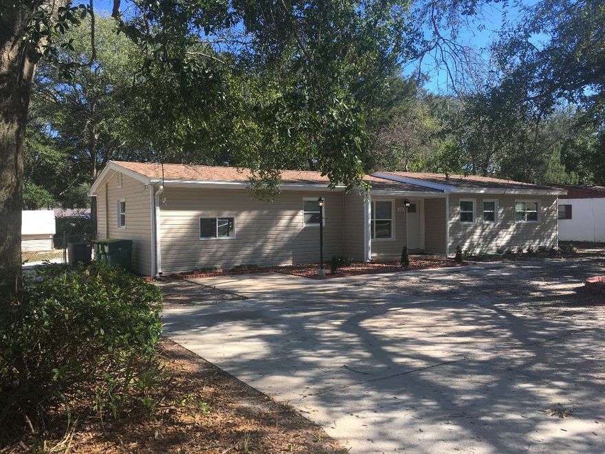 Totally remodeled;Huge fenced yard in the city. Spacious 4 bedroom home for all the kids (sep mother-in law brm with separate entrance.) Newer roof,  (r-30 extra blown insulation throughout ), New vinyl siding , Newer A/C, new carpeting , double pane windows, newly painted , new fixtures, New custom kitchen soft close cabinets, top of the line Stainless Steel Appliances, Granite kitchen counters, new Bathroom vanities and fixtures, Custon wood-grain like ceramic-tile in the living room , 4th brm, kitchen and family room.Pleanty of side and back yard for your pool, parking your RV's, company truck, children playground, etc.easy show .see agent remarks.