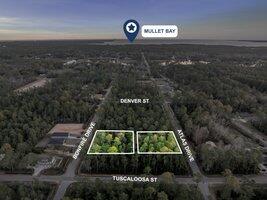 Vacant Raw Land Lots 5-10 and 35-40. Located minutes from I10. 25 minutes from the beautiful pristine white sandy beaches, or canoe down our rivers. Easy located to shopping malls, grocery stores, and much more. So come build your beautiful home.