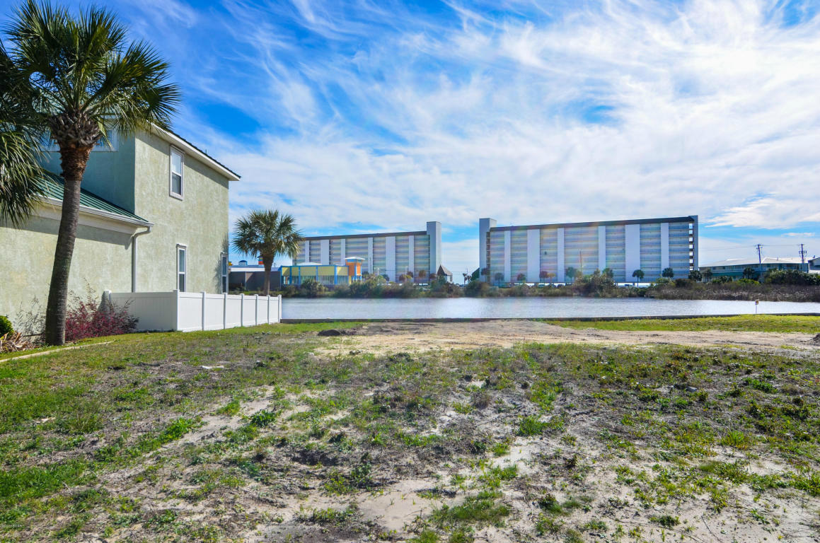Looking for a great Lot close to Beach, golf cart friendly community where you can build your Beach Bungalow or Custom Home? This lot gives you everything. Water views, proximity to beaches, close to Pier Park, shopping and everything Panama City Beach has to offer.