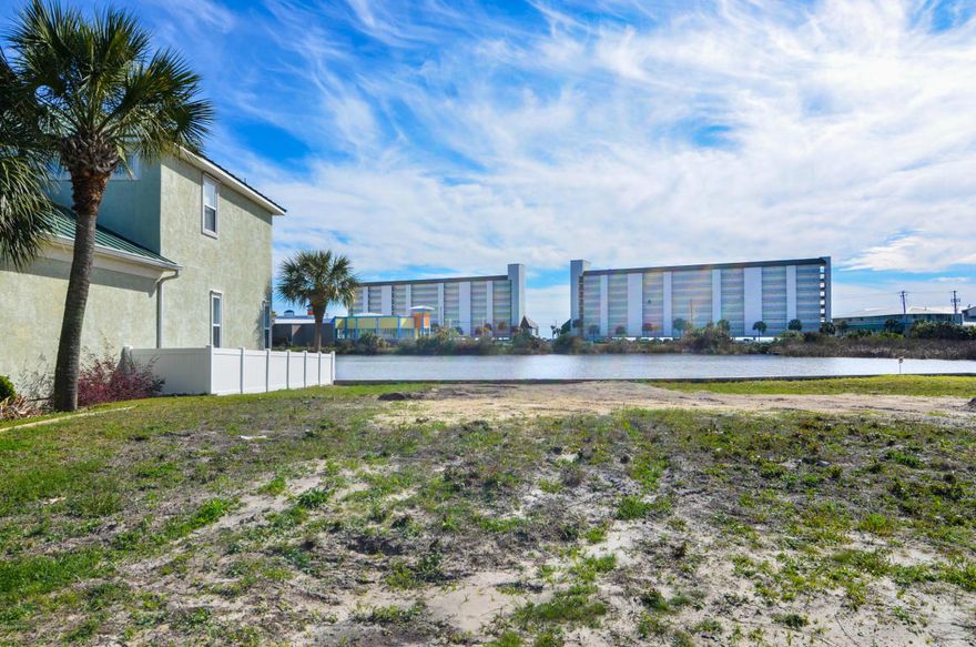 Looking for a great Lot close to Beach, golf cart friendly community where you can build your Beach Bungalow or Custom Home? This lot gives you everything. Water views, proximity to beaches, close to Pier Park, shopping and everything Panama City Beach has to offer.