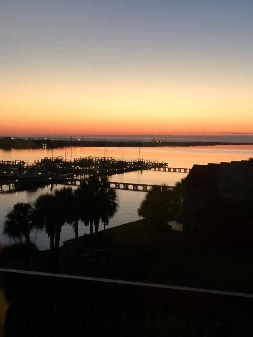 Beautiful unit in Pirates Bay on the 4th floor. Gaze at the magnificent sunsets from your balcony over looking the crystal clear pool below. This is a studio unit, waterfront. Also overlooks the Marina where your deeded 42ft boat slip #B4 contains a Sea Doo Jet Ski, and a jet ski lift! You can even see the Gulf of Mexico in the distance. Completely furnished and almost new A/C and heating unit, water heater, microwave, refrig, and fiberglass front entrance door. Trailer for the jet ski is also included. Buyer to verify room sizes.