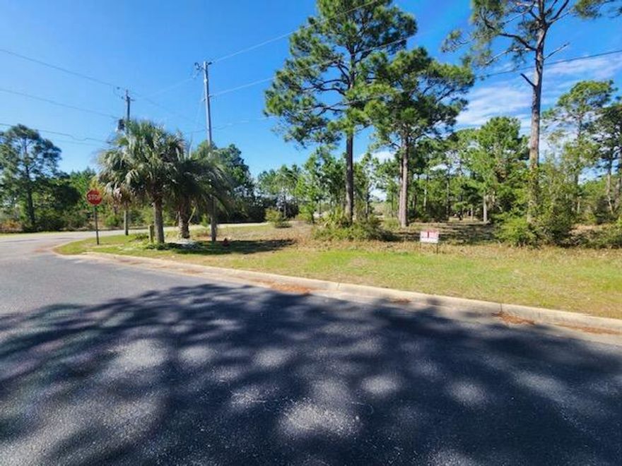 Beautiful bay view lot! Build your dream home on this wooded lot on Pearson Road across the street from the bay. Seller can construct a build to suit home on this lot. Approx.  2,500 sq ft in the price range of $599,000 depending on features and finishes.  Covenants under documents.  Buyer to verify all lot dimensions, covenants, zoning and utiliteis information.