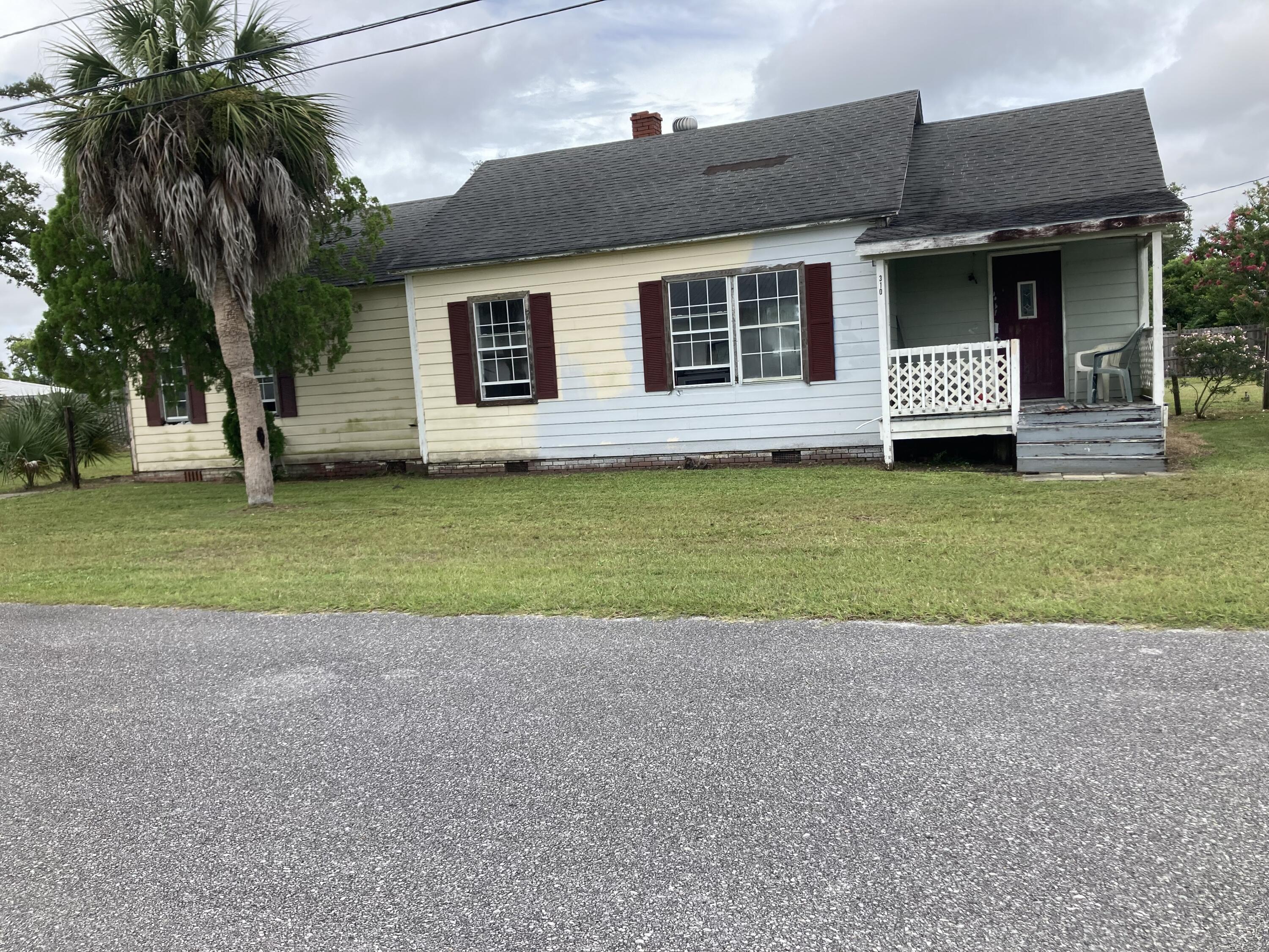 Calling all Investors. This 3BR/2BA house is centrally located in the heart of Lynn Haven. The house was damaged in Hurricane Michael and was never repaired. The house sits on a double lot. The bones appear to good but work is definatly needed. Unfortunately this must be a cash sell because the home will not be able to be financed due to it's current condition. Please be careful when entering the home. There is some sub flooring missing in various places. Long pants and closed tow shoes recommended when viewing.