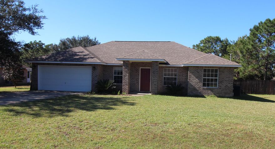 Charming all brick, 1828sqft, 4 BR/2 BA home located in Holley by the Sea. The kitchen has granite counter tops, new stainless-steel appliances, a breakfast bar, and ample upper and lower cabinet storage. The dining room looks into the kitchen and has plenty of space for your dining room table and other dining room furniture. It has a large living room leading to nice flat backyard. The master bedroom has a trey ceiling a spacious master bath with a garden tub, double vanity, walk-in closets, and a private commode. The laundry room and office are conveniently located just off the kitchen. This is a beautiful home that you really need to see to appreciate.