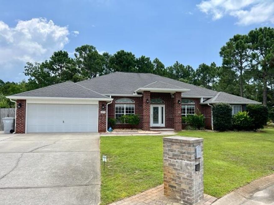 Located in East Navarre this 4 bedroom, plus office/den, 3 Bath, 2534 sq-ft on cul-de-sac house backs up to natural conservation. The master suite has a wing of its own with a sitting area, large walk-in closet and second closet, large walk-in shower and whirlpool tub. The guest bedrooms have their own wing with two of the bedrooms sharing a bath and the 4th bedroom having its own separate bath. The kitchen has granite countertops, stainless steel appliances and overlooks the dining area. Near the entrance, the office/den has french doors and newer flooring. Walk out back into the screened in porch with lots of room to relax and entertain. The large fenced in backyard has a deck, lots of green area and its own private storage shed. Call/Text to schedule! 850-830-7045.