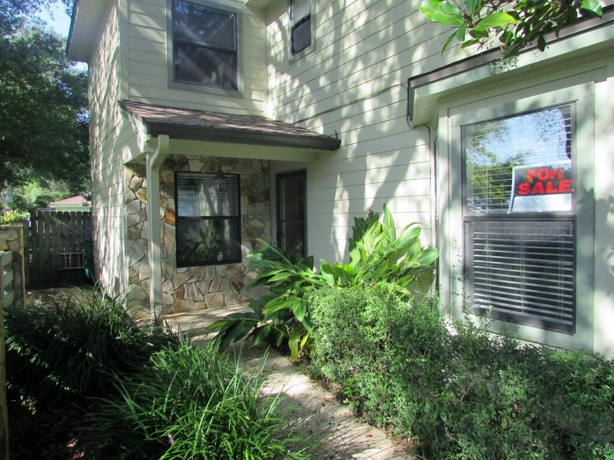 Incredible location in the middle of everything yet tucked away on the bayou. 4 bedroom with 2.5 baths freshly painted, carpets professionally cleaned and new refrigerator and stove. Beautiful grounds that are managed by the association. Owner is in charge of the sidewalk area that leads to front door.  Boat slip available for monthly rent to owner. 2 decks with water view. Come see this nice quaint community and all that it offers. Vacant and easy for appointment to see.