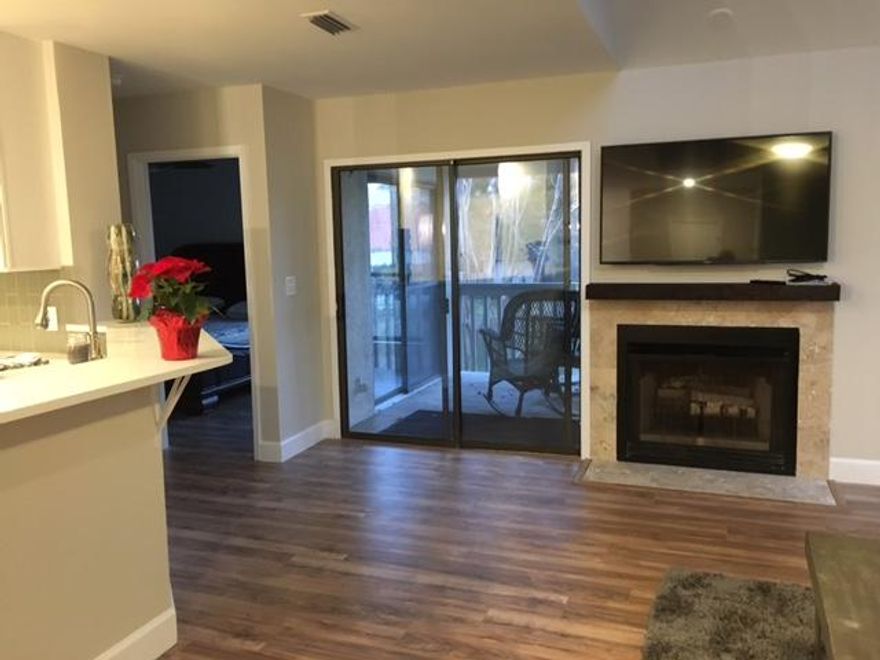 Priced Under appraisal for quick sell! Completely and beautifully remodeled. Seller completed a floor to ceiling interior renovation removing the popcorn ceiling, added recessed light throughout. New paint in all rooms, New floors and baseboard trim in all rooms, all new lighting fixtures and ceiling fans. The kitchen was gutted, the drop ceiling was removed as well as the old cabinets and bulkhead to make way for new tall upper cabinets and new lower cabinets. All new high end stainless steel appliances including range, microwave, refrigerator, dishwasher, garbage disposal, stainless steel undermount sink & stainless steel faucet. Topped off with glass backsplash,quartz countertops & bar top. The master bath has new fully tiled extra large walk in shower, ceiling rainhead (cont.See More)