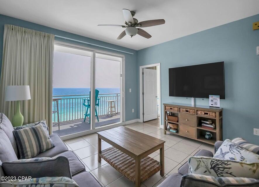 Splash's Incredible Location and outstanding on-site amenities creates a resort that is unique to Panama City Beach. This is an amazing price for a beautifully furnished, Gulf front condo - this 2 Bed, 2 Bath (Wave) floor plan has riveting Gulf views while sunshine and warm gulf breezes abound from the generous balcony The Margaritaville themed unit Features 9' ceilings, a spacious master suite, guest bedroom, a large balcony, and interior upgrades such as slab granite counters in the kitchen and bathrooms & hard surface flooring throughout. This unit is consistently a RENTAL POWERHOUSE. The property is truly turnkey! Meticulously maintained. Perfect elevation within the stack: not too high and not too low! Splash! Offers all the Amenities of a true destination resort...