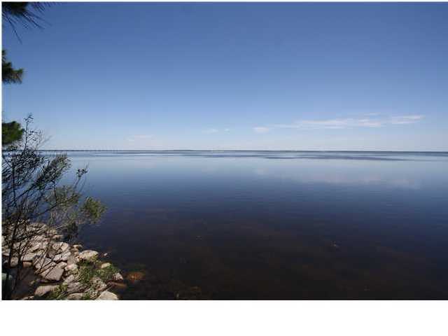 Short sale! New price reduction. This beautiful bay front lot with 106 feet of water frontage. Topographic Survey is under documents. You can build your dream home when you're ready, because there's no build out time limits on this property. Walton Way has some of the most prestigious bay front homes in Walton County. Look no further, this is where you want to build your dream home and watch the gorgeous sunsets over the Choctawhatchee Bay from your own backyard. The property has no wetlands, and a survey is available. You are close to the beaches, shopping, and dining.