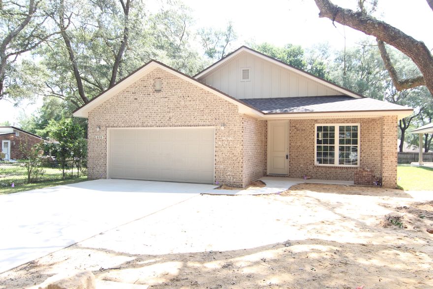 New 3 bedroom 2 bath home in the center of Niceville. This home consists of a brick front with hardi board siding. The open floor plan allows for ease of entertaining! The kitchen has granite counter tops, stainless appliances, wood laminate flooring and crown molding. The living room, dining room and kitchen all have crown molding. All the bedrooms will have carpet flooring and ceiling fans. The master bathroom includes a garden tub, a separate shower, double vanity, and tile flooring. Off the dining room is the covered back porch to enjoy the Florida weather. This home is close to the college, Eglin Air force Base, and the award winning Niceville Schools. Construction estimated to be finished mid May 2016