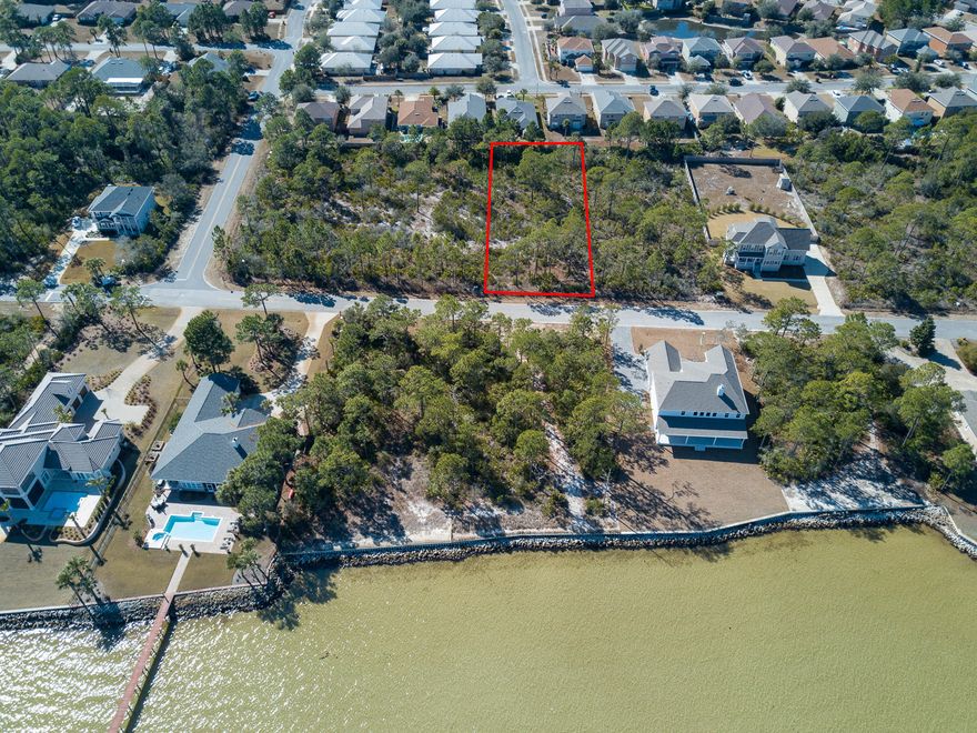 Build your home in this 0.52 acre lot, located across the street from Choctawhatchee Bay in the Driftwood Estates neighborhood. This community offers walking trails, playground, and a community pool with easy access to the shops and restaurants at Grande Boulevard, public boat launch at Legion Park, and Sacred Heart Hospital.Buyer is responsible for personally verifying details about this property. Any information contained in this listing is believed to be accurate but is not guaranteed.