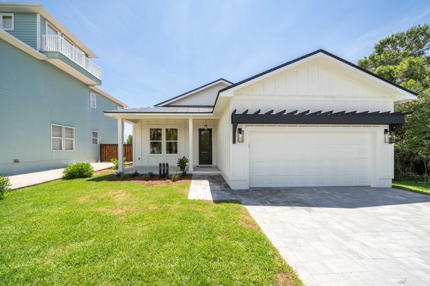 Modern luxury meets coastal design in this charming beach bungalow! NEW CONSTRUCTION that focused on quality & custom details, plus lots of little extras to make this home special. Perfect for your primary/second home or SHORT-TERM RENTALS are allowed. Nestled on the quiet west end of Panama City Beach and a very short distance to 30A. This home is just a 5-MINUTE WALK DIRECTLY TO BEACH ACCESS, enjoy the view of the emerald gulf water while strolling down this quaint street. When not at the beach, kick back in the beautiful backyard which features a LARGE PRIVATE INGROUND SALTWATER POOL (13 ft X 26 ft) with brick pavers, 8-foot privacy fence, outdoor shower, and plenty of space for fun! From palm trees, professional landscaping, covered porches (with upgrade of natural wood tongue & groove ceilings), unique exterior fa??ade using multiple materials, brick paver driveway, and garage door pergola creates a CHARMING CURB APPEAL. Inside, the light tone of the Luxury Vinyl Plank flooring combined with the bonus of 10 ft ceilings and 8 ft doors offers a spacious flow throughout. The GOURMET KITCHEN is the center of attention with white custom cabinets (self-close hinges), upper & lower cabinet lighting, ceramic tile, quartz countertops, starring a large waterfall island, high end lighting, and stainless-steel appliances. Enjoy the stunning wet bar with sink, beverage refrigerator, and extra storage. CUSTOM MILLWORK from bedroom accent walls, slat wall shiplap, window & door trim, wood closet storage systems to the laundry/mudroom hall tree with open storage. LUXURY BATHROOMS with floor to ceiling tile, zero entry shower with frameless glass door, deep soaker tub, freestanding vanities, and luxury fixtures. The 2-car garage is fully insulated, heated, and cooled providing OVER 400 SQ FT OF ADDITIONAL LIVING SPACE that could be used as a fourth bedroom/game room. City Water & SEWER, energy efficient spray foam insulation and so much more. COME CHECK THIS HOME OUT, IT IS A MUST SEE! Buyer to verify all measurements if deemed important.