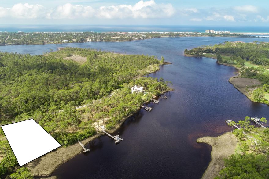 Fantastic value in Wild Heron. If you like resort style living, you don't want to miss this opportunity to own this affordable Lakefront Type A lot on Lake Powell. Wild Heron is a gated community and proud owner of the highly acclaimed Greg Norman, Sharks Tooth golf course and sits directly on Lake Powell, one of the regions' largest coastal dune lakes, a natural estuarine transition between the Gulf of Mexico and inland area. Amenities include Shark's Tooth Golf Club, a lakeside grill and fire pit, community swimming pool, hot tub and fitness center overlooking the lake, boardwalk, trails and parks. The Boathouse at Prospect Point includes a dock for access to Lake Powell and is well stocked with kayaks and canoes for residents' use.