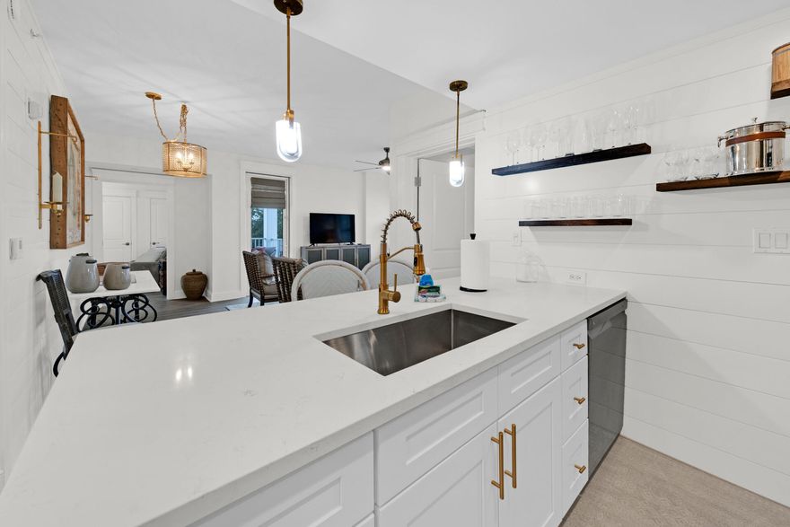 Completely Renovated 2/2 unit at THE GRAND SANDESTIN. This stunning fully FURNISHED -TURNKEY condo is a 4TH floor corner unit with a split bedroom floor plan. Brand new HVAC in 2022, LVP hard surface flooring throughout, all new furniture, appliances and bathrooms upgraded and California closets.  Rental Projections $45k $50k.  The living area is light & bright with ample windows and a door leading to the covered balcony looking East over the resort.  Slight view of the bay. The Grand Sandestin welcomes you with gracious architecture and on-site amenities including a fitness center, swimming pool, seasonal concierge & on-site check in.