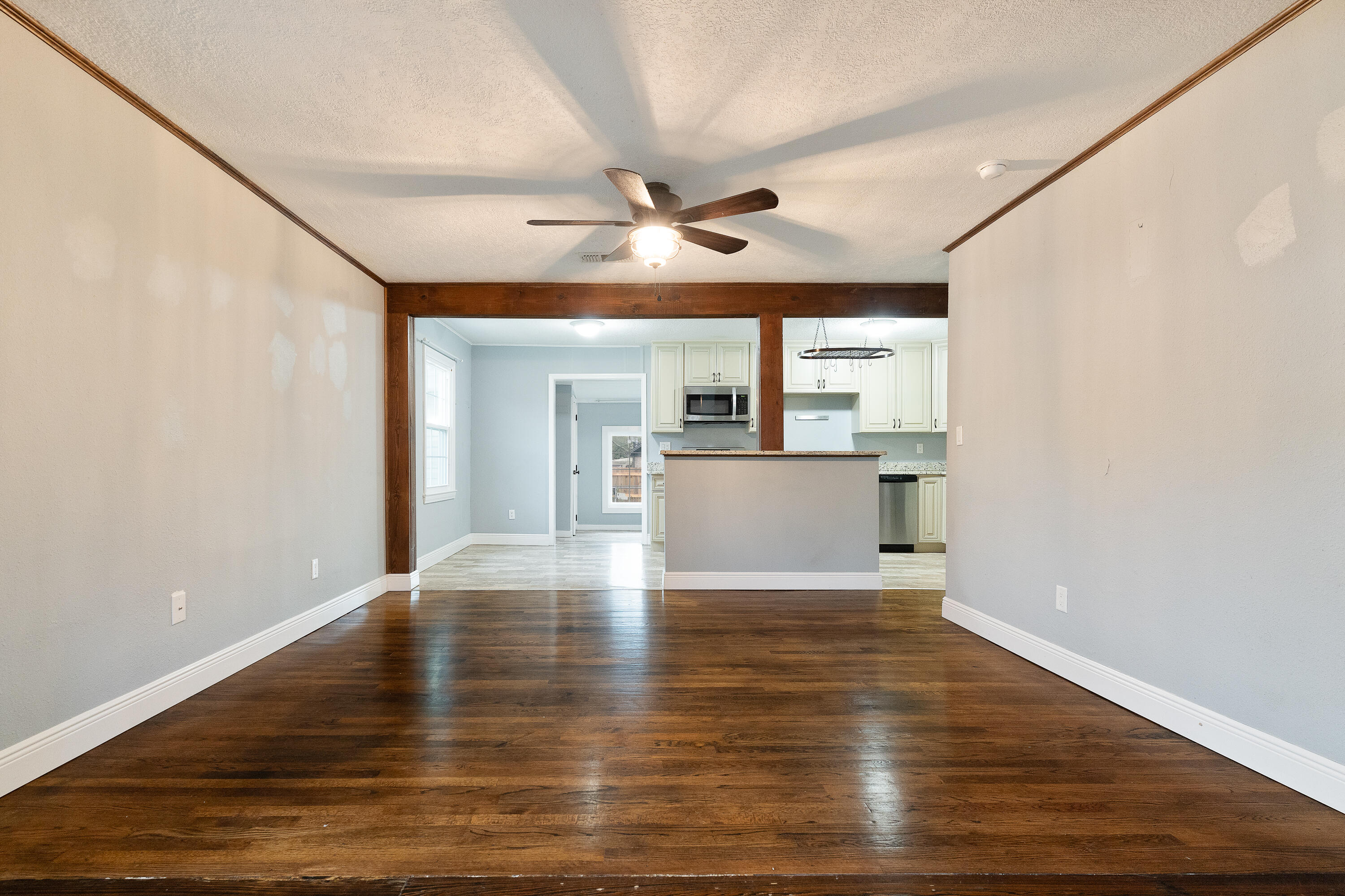 Your Florida Cottage in the heart of Niceville awaits! This charming home was tastefully remodeled featuring an updated kitchen with stainless steel appliances, granite countertops, windows, and custom soft-close cabinets. Wood flooring and natural light add to this home's appeal! Enjoy the convenience of an indoor laundry room located off the sunroom/playroom. For the hobbyist, there's a dedicated workshop space. The spacious backyard is perfect for outdoor gatherings and gardening enthusiasts. The home's prime location offers easy access to local schools, parks, shopping, dining, beaches and bases! Known for a friendly community, this is a great opportunity in Niceville! ROOF AND HVAC 2017. Buyers are advised to verify all data and dimensions.