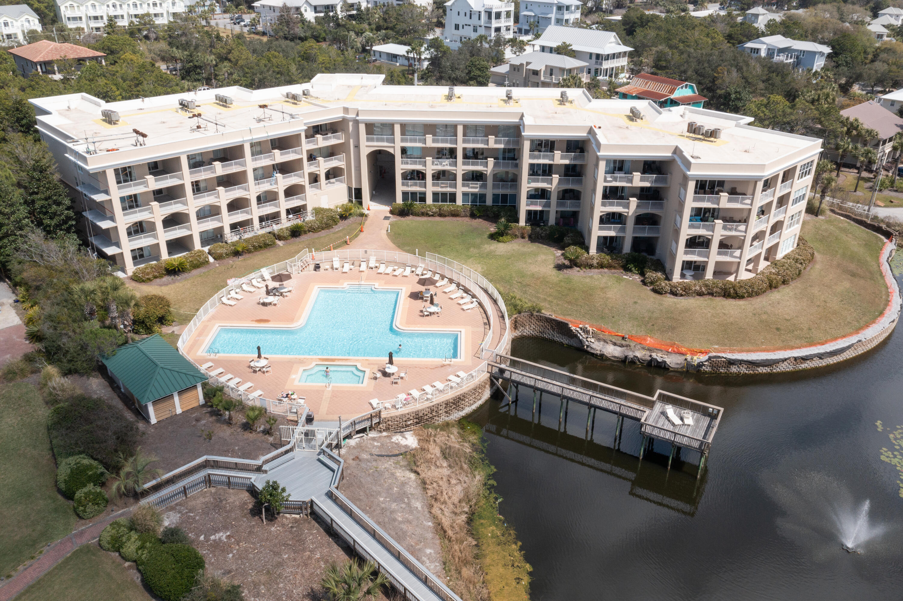 Bright, rustic, and updated first floor condo in the highly sought after San Remo Condominiums. The newly refurbished outside patio takes you directly to the beautiful community pool that leads to the deeded beach access. Whether you're looking for a strong rental ($90k in 2021, tracking at $100k in 2022) or the perfect second property getaway, this 2 bedroom, 1 bunk room with 2 baths is the answer. While the recent exterior work done to the outside areas including patios have given new life to San Remo, buyers who want a turnkey rental with great potential will be drawn to this quaint and comfortable unit. Shiplap walls add a nice touch to the built in bookcases and one of a kind kitchen design. Ready to break into the rental market? Act fast and see this condo today!