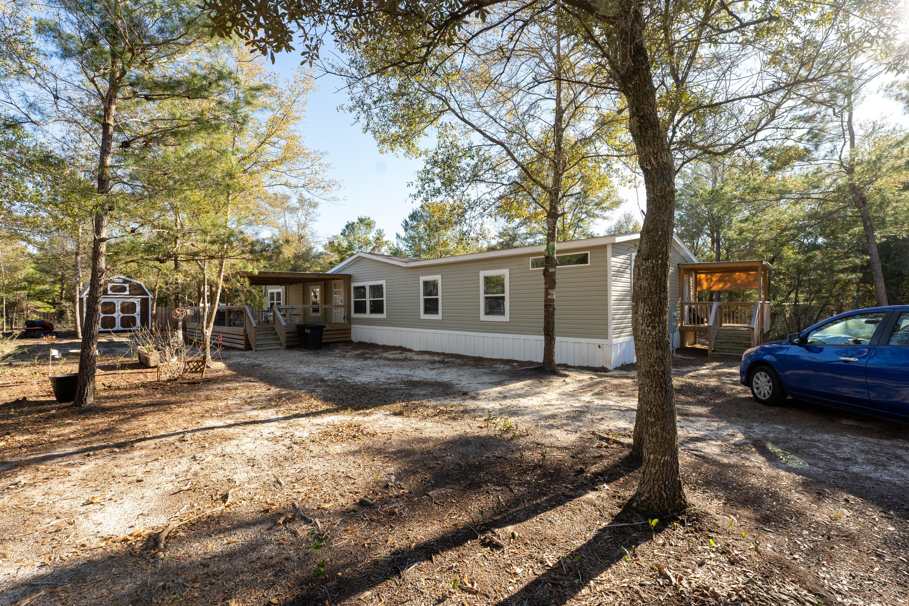 Four (4) Bedroom, Three (3) full baths in this 2021 home on a fully fenced 1.12 acres Family room with built in shelving; Laundry Room / mud room is a dream including island for folding, countertops, cubbies for shoes and racks for the coats, purses and back packs. 16x 32 front deck for enjoying the outdoors, Yard boasts of the fire pit, and a 12 x 16 shed. Professional Photos being taken on January 4, 2023