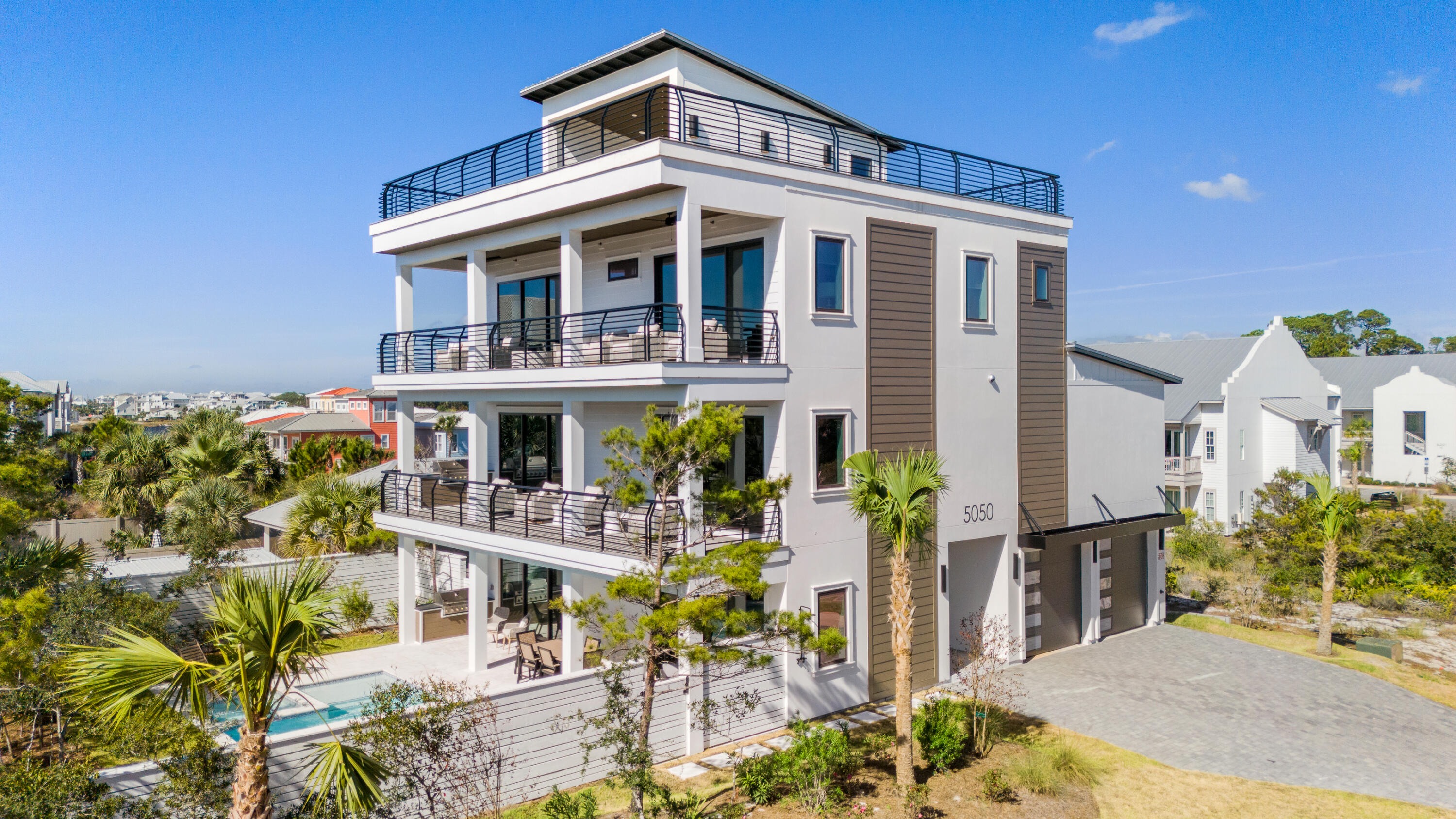 Something special ,a newly constructed home with large PRIVATE POOL and HOT TUB on the west end on spectacular 30A. Plenty of parking for large groups .Take the elevator up to the luxurious rooftop of this 4 level home with breathtaking gulf views . Home has just not one but  three grilling areas, and truly a recreational oasis for family games and parties on the fourth floor rooftop . Upgraded appliances and shiplap finishes throughout the  6 en-suite bedrooms. Fabulous open kitchen/great room fireplace floor plan.Enclosed garage .Short walk to the white sand beaches .  Plenty of shopping and restaurants nearby.  Call me for rental projections from 30a Rental Properties 850-238-2151 Hayden