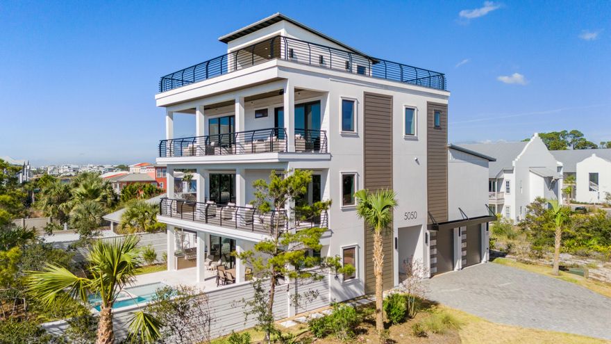 REDUCED $1,000,000 YES ONE MILLION Something special ,a newly constructed home with large PRIVATE POOL and HOT TUB on the west end on spectacular 30A. Plenty of parking for large groups .Take the elevator up to the luxurious rooftop of this 4 level home with breathtaking gulf views . Home has just not one but  three grilling areas, and truly a recreational oasis for family games and parties on the fourth floor rooftop . Upgraded appliances and shiplap finishes throughout the  6 en-suite bedrooms. Fabulous open kitchen/great room fireplace floor plan.Enclosed garage .Short walk to the white sand beaches .  Plenty of shopping and restaurants nearby.  Call me for rental projections from 30a Rental Properties 850-238-2151 Hayden