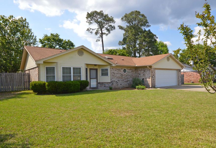 Welcome Home! This home offers a LARGE eat-in kitchen with a skylight, and a separate dining room for entertaining or can be used as a nice office. The large Great room has a beautiful wood-burning fireplace, the spacious master suite has double vanities and double walk-in closets, even the 2nd bedroom has a walk-in closet. Large inside laundry, and all blinds, ceiling fans, refrigerator are included. Outside has a sprinkler system on a well, covered back porch and a yard building. There is also a detached carport to put a boat under with storage. This home has only had one owner. Great schools and near Naval Hospital, NAS and Perdido Bay.Call today for a private showing!