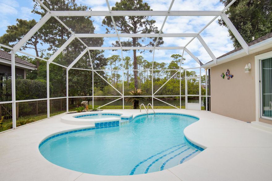 Here is one of the finest custom built homes in Emerald Lakes. This lake front home is completely renovated and shows Brand New. Driveway has been recently pavered. Open and spacious, split bedrooms, with great views of the pool from all 3 bedrooms. New GE kitchen appliances including convection microwave and oven and gas stove, crown molding and walk-in closets in all bedrooms,totally tiled, water heater is gas, new ceiling fans and light fixtures to name a few. Recently resurfaced gunite swimming pool with built in hot tub, newly painted and tiled deck.
Emerald Lakes is a gated and private subdivision which has a community swimming pool, tennis courts grills, and basketball court. There are 10 foot ceilings in the home and trey ceilings with accent lighting. The master bedroom is extra large and has a nook just perfect for a desk that faces the lake, and the master bathroom has a double vanity, separate easy access shower with sitting bench, and a large Jacuzzi tub. The home has pool alarms on every door leading to the pool and a home security system, plantation shutters, real hard coat stucco, walk in closets in all bedrooms, and easy access showers are also located in the 2nd and 3rd bedrooms. There is a separate enclosed storage room in the garage along with the pull down stairs and storage in the attic. The water heater and dryer are gas and there is a a water softener.