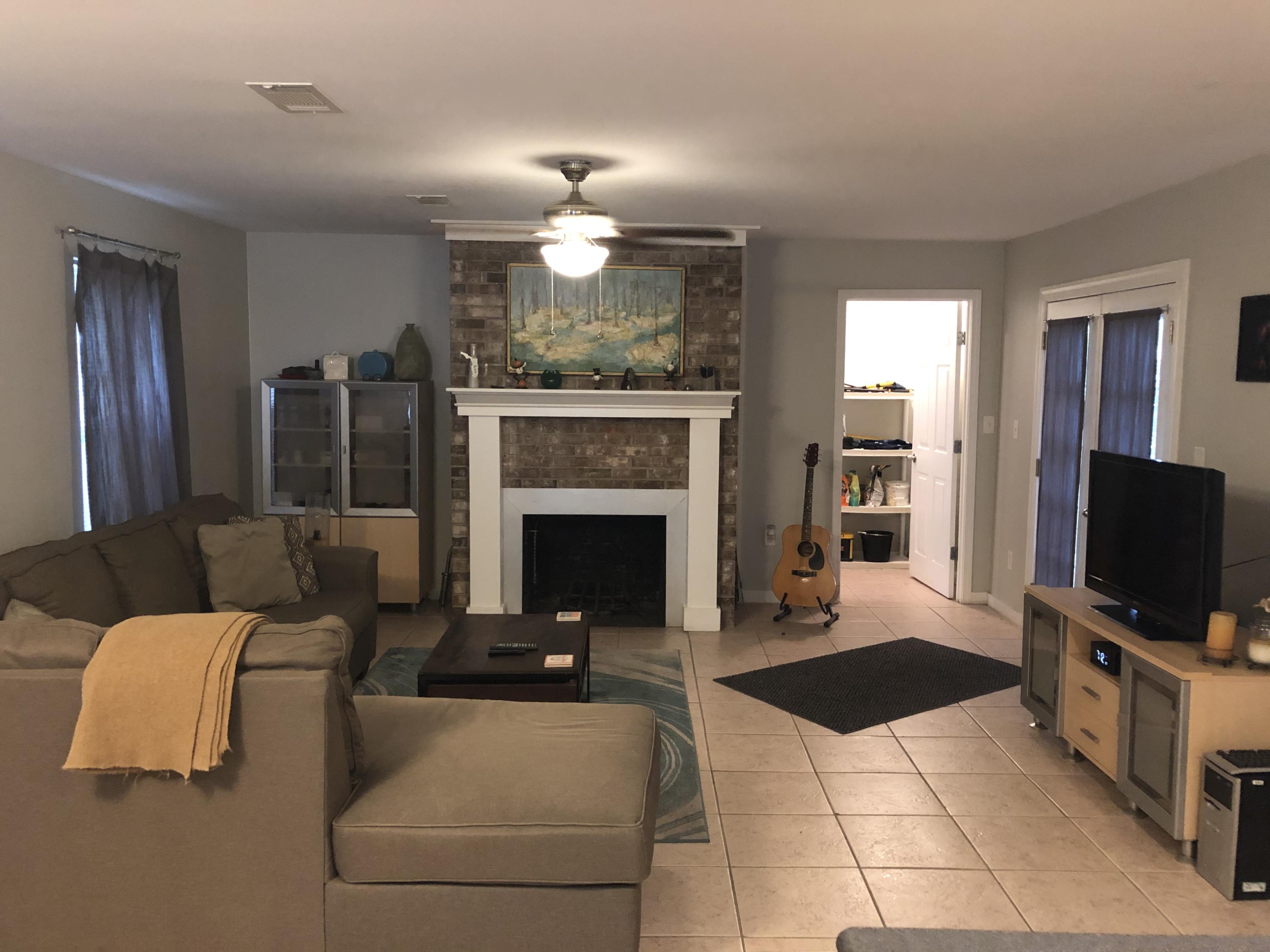 Do NOT miss your chance to move into this gem in DeFuniak Springs. This home is totally renovated from flooring to the roof. Including plumbing, electrical and windows. There are 2 livingrooms with fireplaces in both! You can access the back deck from not only the living room, but the master bedroom as well. Back yard is totally fenced in with a storage shed. MOVE IN READY! Priced to sell.