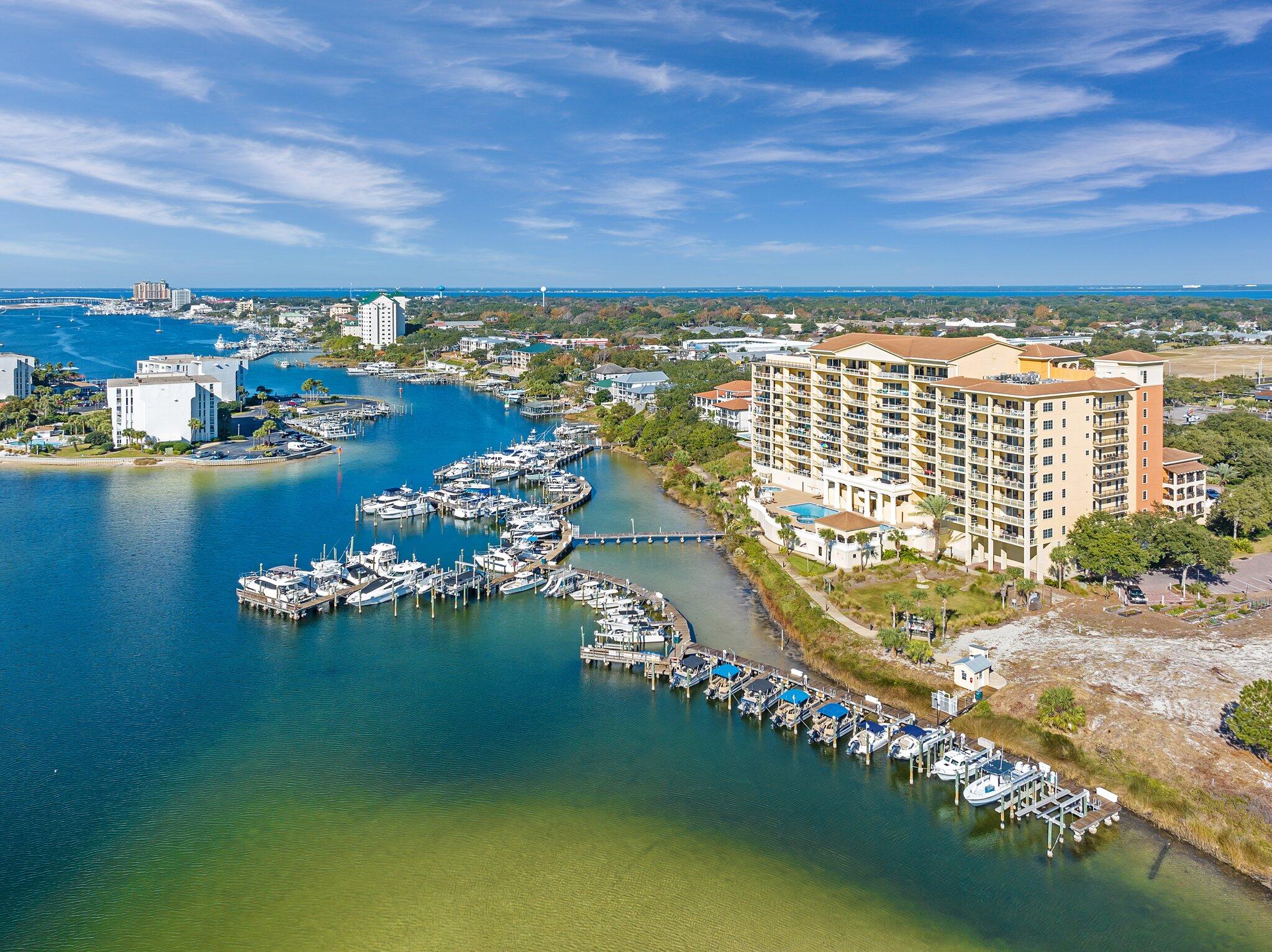 Marbella is a fabulous Condominium Complex that is located in the Heart of Destin directly on the Harbor. Unit 3i is a 4 Bedroom / 3 Full Bath ''WEST SIDE CORNER UNIT'' and is at the perfect height to enjoy spectacular views & Sunsets. At night the Harbor lights up featuring colors that make the views in all directions truly magnificent.  Also, you and your guests will have a front row seat for every awesome Fireworks Display that the City of Destin puts on throughout the year.  Waterfront Living does not get any better that this.  Marbella features a beautiful Entrance Foyer, 2 Personal Covered Parking Spaces for you, a Fitness Center, Community Room, and a fabulous Swimming Pool, Hot Tub, and outside Entertainment Area.  Please look at all of the Photos of this Phenomenal Unit! Additional features that make this new home for you special is the  fact that you can literally walk to the Destin Harbor Entertainment Area where there are lots of venues where you can enjoy food and entertainment, places to rent boats to go fishing, Pontoon Boats to head to the Bay and the World Famous Crab Island for the day, etc.  There is an Electric Fireplace that adds ambiance to your evenings.  There is an Electric Grill on the spacious Balcony.  Marbella is also home to Marbella Yacht Club.  There are a few boat slips available for purchase so you can easily bring your boat as well. Marbella is luxurious from the Grand Front Entrance to the spectacular Harbor Front Pool and Entertainment Area.  Marbella is located 2 minutes away from a brand new Publix Shopping Center.  You can walk to it in 4 minutes.  If you don't want to walk to the Harbor District for the night you can take the Harbor Water Taxi.  There are no Short Term Rentals allowed so when you want to relax on your terms you can.  Check out the "Night Time Video" that was taken from the Balcony of Unit 3i as the Harbor is as gorgeous at night as it is in the day.  Hurry, make arrangements to see this one today!!!
