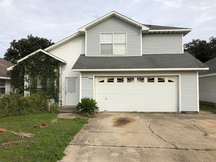 Two Story, 4 Bed/2.5 Bath Home located less than 1/4 Mile from Santa Rosa Sound Water Access in the Charming and Desirable Neighborhood of Ivalea Gardens. First Floor has 18 x 18 Ceramic tile throughout, Spacious Kitchen with Stainless Steel Appliances, Travertine Tiled Counters, Tiled Backsplash, plenty of cabinetry and accent lighting, along with a bedroom that would also be great for an office, a half bath, and a large dining area. Additionally, the main floor comes with vaulted ceilings and extra storage under the stairwell. Second Floor has the Master and two additional bedrooms and 2 full baths, as well as a large Bonus Storage area at the top of the stairs. Both bathrooms have Travertine counters, with Dual Vanities in the Master, and a sizable Master Closet.