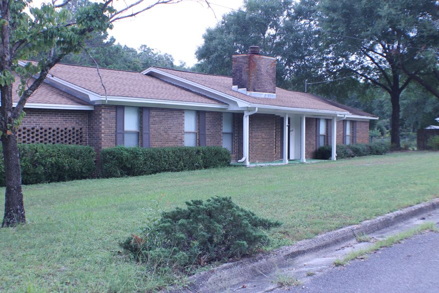 Large ranch style home for a large family! 3 bedrooms 2 bath with a bonus room that can be used as a 4th bedroom, game room, guest room, or additional family room! Large pantry room or storage space, along with a utility room, and laundry room! This house also has a sunroom for having your morning coffee overlooking the big back yard with a little stream that is approximately 1.5 Acres. 2 car carport and shed as well!!! Come see this one today!! Call Paige for showing appointment.