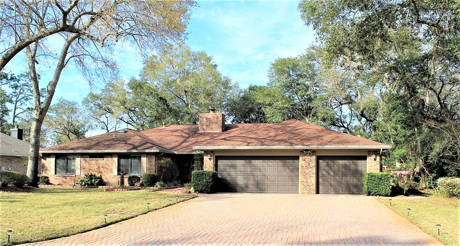 Beautiful golf course home with lake views overlooking the 9th fairway of the Bay Course at Bluewater Bay is ready for its new owner. Current owners have done extensive remodeling, adding warmth along with functionality and value. Updates include: Acacia wood flooring, interior paint, pool w/heater, lexon coverings in patio area, new light fixtures, bathroom counters and toilets and a complete remodel of master bath. Large great room with incredible views, Florida Room, and a Formal Dining Room. Gourmet kitchen is a chef's dream with quartz countertops, large island, walk-in pantry, plenty of cabinetry and a breakfast nook and breakfast bar. Large master suite with multi-purpose room, walk in closet and built ins. Large additional bedrooms with separate baths. THIS IS A MUST SEE!