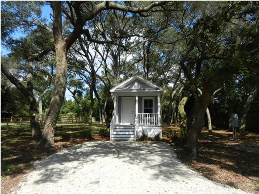 Do you want to simplify? Here is your answer. Simple cottage living on a half acre lot with gorgeous oak trees. Lot is fully fenced. This is an efficiency sized apartment appropriate for single individuals. Great units, agricultural neighborhood so animals are welcomed, grow a garden, be at the beach in less than 10 minutes and enjoy this simple lifestyle! Furnished with stove, microwave, refrigerator, stack washer and dryer. These cottages are very well built and can withstand high winds. Metal roof, masonite siding, hardwood floor in bedroom, linoleum everywhere else, ceiling fans, brand new washer and dryer and central heat and air. What a great location just around the corner to the EOD school, right across the bridge to the beaches and within walking distance to Bluewater Elementary.