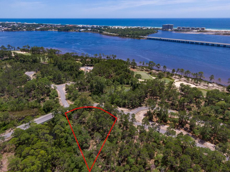 Prime lot available in the pristine gated community of Wild Heron, a 734-acre Coastal Sanctuary, located on the shores of Lake Powell, Florida's largest coastal dune lake. Located across from and backed by a preserve it provides a feeling of seclusion and privacy, yet it is only a short walk, bike or golf cart ride to world class amenities overlooking Lake Powell.  It is a must see property.