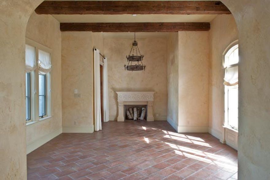 This exquisite home is one of the most elegant and unique homes in Rosemary Beach, overflowing with refined luxury, warm accents, and rich architectural detail. From the rough-hewn, 200-year-old pine beams in the main living areas, to the solid mahogany interior doors with antique brass hardware, to Italian terra-cotta tile and Brazilian cherry floors, no detail has been overlooked in creating this Spanish Colonial jewel. Highlights include a first floor master suite with an opulent solid marble tub and oversized tiled shower; a well-appointed chef's kitchen with stone countertops, large pantry, SubZero refrigerator and Wolf range, all open to a large dining area; and a grand living room highlighted by a large fireplace with a custom marble mantle. Two large bedrooms with their ow